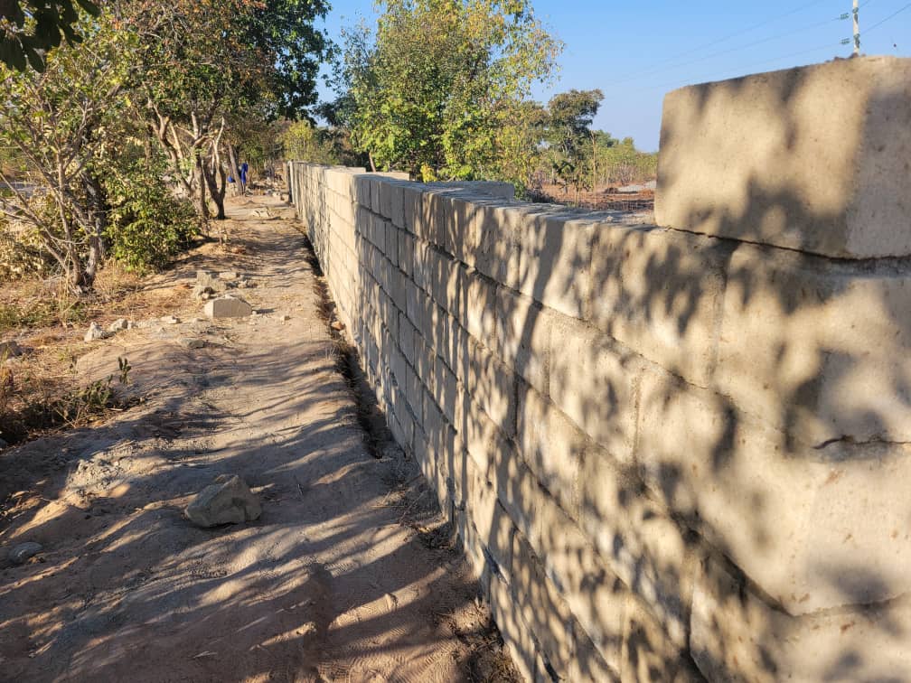 Block by Block: Cement Molding Begins for School Perimeter Fence